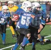 Palmer’s Leif Mumma runs the ball while being guided by teammate Parker Smith against Kodiak in the Cub Bowl Saturday at Joe Floyd Track and Field. DEREK CLARKSTON/Kodiak Daily Mirror