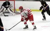 Wasilla senior Larsen Tubbs prepares to put a shot on goal during a 4-1 win over Lathrop Jan. 21 at the Brett Memorial Ice Arena in Wasilla. Tubbs scored a goal in the game. Courtesy Bruce Eg