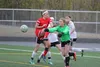 Colony goalkeeper Maddy Zmuda knocks the ball away from Wasilla's Ally Hull during Wasilla's 5-2 win over the Knights April 25, 2016, at Colony High School. Jeremiah Bartz/Frontiersman