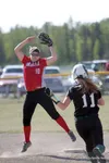 With the ball in her glove, Wasilla senior Cassidy Edwards tries to get the force out during a 9-3 win over the Colony Knights last week in Wasilla. The Warriors finished 7-1 in Railbelt Conf