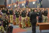 Lt. Gen. Bruce T. Crawford, Army chief information officer and G-6, administers the Oath of Enlistment to 30 young men and women from the Baltimore and Richmond areas during a “Why We Serve” 