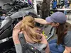 Maintenance clinics, like the one shown here at Team CC Skidoo, provide riders with the know-how to be safe and have fun in the trails this winter. Courtesy of Sierra Winter