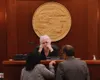 Speaker of the House Louise Stutes, R-Kodiak, talks to House Minority Leader Cathy Tilton, R-Wasilla, and Rep. George Rauscher, R-Sutton, during debate on the last regular day of the Alaska L