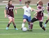 Palmer senior Miracle Burton splits the Ketchikan defense during a 1-0 loss to the Kings Wednesday at Palmer High. JEREMIAH BARTZ/Frontiersman