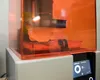 A Montana Mask is being printed on a Formlabs 3D printer March 31, 2020, at the 168th Maintenance Group hangar on Eielson Air Force Base, Alaska. Due to a shortage of N95 masks Airmen with th