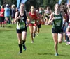 Colony's Jill Bowker, right, stays ahead of a Kodiak runner during the varsity girls race of the Soldotna Invitational Satruday, Aug. 20, 2016, in Soldotna. Bowker finished 11th. Jeff Helmini