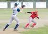 ROBERT DeBERRY/Frontiersman Wasilla’s Keith Pulver is caught in
a run-down during Friday’s game against Soldotna at Wasilla High
School.