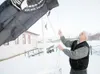 ROBERT DeBERRY/Frontiersman Veterans of Foreign War Post 9365
member John Minnick raises the POW/MIA flag Monday in Wasilla.