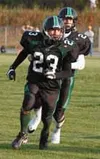 Colony running back Shawn Olivera runs in front of fellow senior
Rhett Magner, blocking for the quarterback during the first half of
the Knights' 35-0 win over the South Anchorage Wolverines 