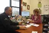 Dave and Judy Snyder look through a pile of thank you letters from kids in the 4-H program. The Snyders own Diversified Tire, which is celebrating its 25th anniversary. Jacob Mann/Frontiersma