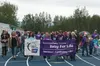 Fourteen-time cancer survivor and author Care Tuk leads a group of fellow fighters around the Palmer High School track for last year’s Relay for Life of Mat-Su event. This year’s Relay is at 