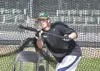 ROBERT DeBERRY/Frontiersman Mat-Su Miner Michael Suiter squares
up to bunt during batting practice Monday afternoon at Hermon
Brothers Field in Palmer.