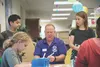 Jim Campbell, Joint Base Elmendorf-Richardson Library technician, builds a catapult with Science Club attendees at the JBER Library, July 5, 2018. JBER Library staff create unique Science, Te