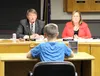 Gabe Lund, 12, addresses the Wasilla City Council Monday evening toward the end of a lengthy debate about a book many parents say is inappropriate. Lund spoke at his first city council meetin