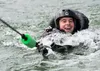 A 389th Fighter Squadron aircrew member is dragged behind a boat during water survival training Aug. 06, 2019, at C.J. Strike Reservoir, Idaho. This portion of the training allows pilots to p