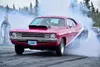 One lucky mother won a trip down the racetrack with racer Pam VanDenBerg in a drawing held during the Hunison Memorial Race at Alaska Raceway Park on Mother's Day, May 10. Courtesy J. Hill Ph
