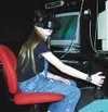 Willow Elementary sixth-grader Kayla Harding flies a plane in
the virtual reality simulator Thursday morning. Photo by CASEY
RESSLER/Frontiersman.