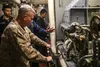 200123-M-KE756-1144 RED SEA (Jan. 23, 2020) Gen. Kenneth F. McKenzie Jr., commander of U.S. Central Command, tours the main machinery room onboard the amphibious assault ship USS Bataan (LHD 