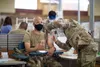 Lt. Col. John Gwinn, commander of the 3rd Battalion, 7th Field Artillery Regiment, 25th Infantry Division, receives the Pfizer-BioNTech COVID-19 vaccine at Schofield Barracks, Hawaii, Jan. 14