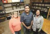 Frontline Mission volunteer Patti Pepperd,Wasilla Lake Church of the Nazarene Manoj Ingle and Frontline Mission director of development and communication Vandana Ingle stand inside the food p