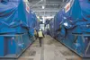 Tony Zellers, director of the Eklutna Generation Station Project, walks between two of the 19-foot-tall, 65-foot-wide and 390-ton Wartsila engines that will power the plant. The new generatio