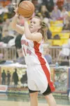 ROBERT DeBERRY/Frontiersman Wasilla guard Skyler Nuss takes a
shot against Chugiak during the 2008 4A state tournament. Nuss in
one three juniors and four upperclassmen on a squad that featur