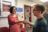 In the front office, Wasilla High assistant principal Kelly Maki shakes hands with Derek Siems. Mrs. Maki joined Wasilla High in August after moving to the Matanuska Valley a year earlier fro