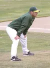 JEREMIAH BARTZ/Frontiersman Mat-Su assistant coach Craig Ringe
keeps an eye on the hitter from his spot as third base coach during
a recent game. Ringe is serving as the team’s interim field 