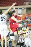 ROBERT DeBERRY/Frontiersman Corey Mock flies towards the basket
for two points during Tuesday's 4A state basketball semifinal game
against the Soldotna Stars.