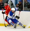 Palmer sophomore Matthew Johnson makes a move toward the puck during a 4-3 win over West Valley. Courtesy of Jeff Heard/Northern Renegade Photography