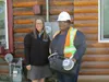 Julie Estey, left, director of external affairs for MEA, and Keevah Davis, an MEA meter reader, pause for a photo. Courtesy MEA