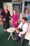 Chris (Ben Drebert), seated, reads his brother's final letter to
his parents and fiance, who are, left to right, Joe (Grant Olson),
Kate (Bonnie Honkola), and Ann (Krista Schwarting) in Valle