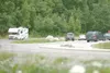 ROBERT DeBERRY/Frontiersman A motorhome passes a pullout and
salmon viewing platform along the Little Susitna River on
Palmer-Fishhook Road Friday afternoon. The Mat-Su Borough Assembly
is co