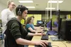 Braden VanderWheele, Dani Klebesadel and Tobin Hushower play Overwatch while Nichelle Henry watches. Tim Rockey/Frontiersman