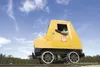 A 1983 TMC-2 Tamper speeder moves along the tracks near South
Mack Drive in Wasilla Thursday afternoon. This restored railroad
work car is part of the Motorcar Operators West group that will 