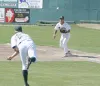 Jeff Gilmore makes a throw to Mat-Su Miner first baseman Matthew
Inouye during a contest with the Alaska Goldpanners earlier this
season. Photo by JEREMIAH BARTZ/ Frontiersman.