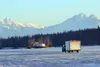 A vehicle hauling a trailer makes its way across Big Lake on Wednesday. MATT TUNSETH/Frontiersman