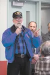 Dave Glenn addresses a listening session with Alaska Department of Veterans Affairs officials Tuesday at the Menard Center. Glenn said he had experienced glitches, but was satisfied with the 