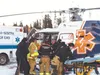Responders load one of two injured pilots onto a waiting medevac helicopter Jan. 31. The National Transportation Safety Board released a preliminary report on the crash Tuesday. Photo courtes