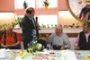 Palmer Mayor Jim Cooper presents John Dolenc with the key to the
city on Dolenc's 100th birthday. Cooper also awarded Dolenc a
commemorative proclamation recognizing his service to the city o