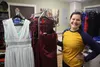 Wasilla High School senior Madeline Emmi shows off the remaining prom dresses for an annual Prom Dress Drive. Jacob Mann/Frontiersman