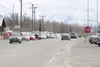 Cars wait in line at the intersection of Herning and Main Street in downtown Wasilla Wednesday afternoon during rush hour. Changes to zoning in the downtown district are intended to make the 