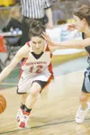 Shelby Fulton, left, cuts toward the basket during a state
tournament game against Chugiak. After helping lead Wasilla to two
conference titles and state crown in three years, Fulton has a
ch