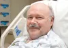 Norman Knaak, 55, smiles from his hospital bed at Mat-Su Regional Medical Center. Knaak experienced sudden cardiac death with witnessed ventricular fibrillation arrest while giving a final pr