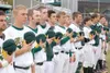 ROBERT DeBERRY/Frontiersman The Mat-Su Miners stand with their
hats off during the singing of the National Anthem at the team’s
home opener Monday at Hermon Brothers Field in Palmer.