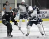 Colony's Robbie Yundt and Soldotna's Marshall DeRaeve battle for the puck Saturday, Jan. 7, 2023, at the Soldotna Regional Sports Complex in Soldotna, Alaska. Jeff Helminiak/Peninsula Clarion