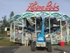 Workers with Golden Wheel Amusements ready one of the company's rides for operation on Monday, August 24 at the Alaska State Fairgrounds in Palmer. Organizers say they expect around 300,000 v