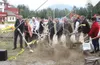 ANDREW WELLNER/Frontiersman Sean Parnell, fifth from left, joins
other Valley and state dignitaries in ceremonially breaking ground
for the new Palmer Senior Center. The ceremony, held Wednes