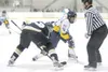 ROBERT DeBERRY/Frontiersman Alaska forward Andy Pearson wins a
draw during a 4-2 win over Bismarck on Saturday. Bismarck came from
behind to score a 6-4 win over the Avs Sunday. The two teams