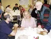 Courtesy photo/James Moren Christopher E. Rogers Sr., left, and
his fiancé Elann Moren, center, at the recent 70th anniversary
celebration for St. John’s Lutheran Church in Palmer. Rogers was